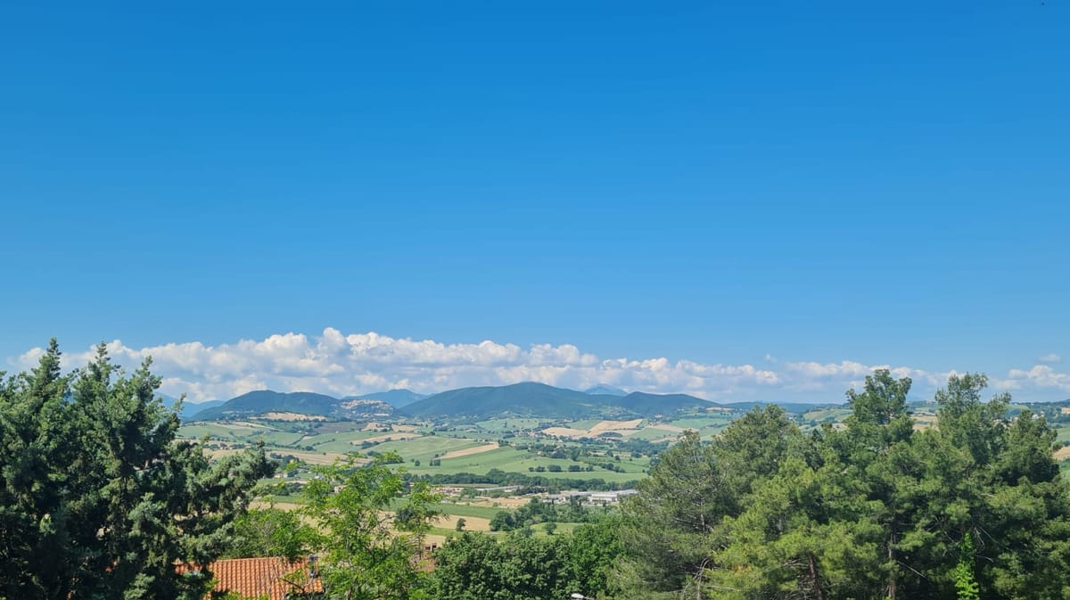 View over the Marche hills from the balcony of the Sun Apartment